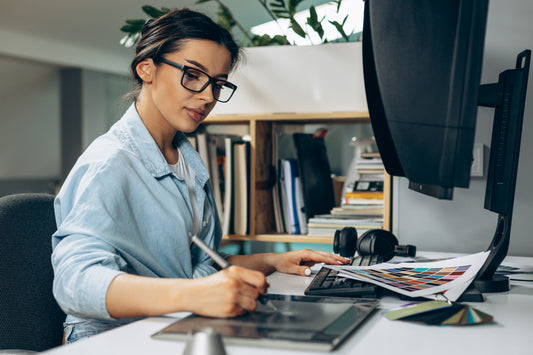 Woman creating graphic designs on the computer